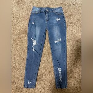 Distressed Women's Blue Skinny Jeans